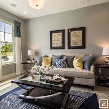 Decorative throw pillows for sofa gray. Neutral Tan Sofa With Blue Grey And Celery Green Throw Pillows Green Pillows Yellow Living Room Living Room Spaces