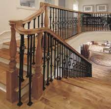 Stairs supplier.stainless steel glass railing.wrought iron railing.balusters.metal spindles,rod iron picket,ornamental wrought iron gate , fances.banister, wood newel post & handrails,red oak tread ,nosing for hardwood & laminate flooring. Stair Makeover Replacing Wood Balusters With Wrought Iron Balusters