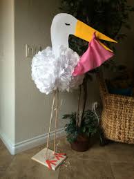 Diy Baby Shower Stork Use White Tissue Paper For Feathers Or Body Felt For Head And Beak 2 Wood Dowe Feather Baby Shower Baby Shower Fun Stork Baby Showers