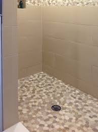 We have had a pebble stone floor installed in our bathroom. Pebble Tile Flooring Tilehub