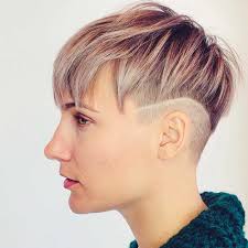 For a super curly short style, try out androgynous hairstyles like this curly crop! 30 Fresh Androgynous Haircuts For Modern Statement Makers