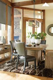 Sommerford Dining Room Timber And Tanning Dine In Style While Scaling Back On The Fuss As This Dining Table Dining Table Corner Moulding Ashley Furniture