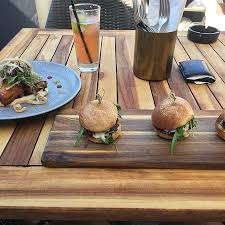 The peninsula is actually a huge sandbar, with a sheltered bay on the inner harbour side and a magnificent surf beach on the ocean side. Mount Maunganui Food Guide 10 Must Eat Restaurants Street Food Stalls In Mount Maunganui