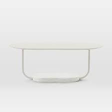 Both chic and functional this pop up table offers accessible storage so you can keep things such as games blankets and books in reach but out of sight. Clifton Coffee Table
