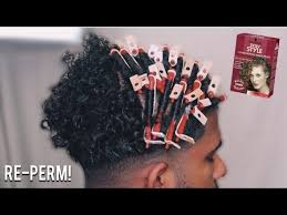 Wrapping your hair around rods, and applying a chemical treatment. Straight To Curly Re Perm Schwarzkopf Perm Kit Youtube