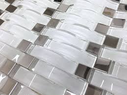 Glass tile backsplashes glass tile is ideal for backsplashes. 3d Waves White Glass With Chrome Metal Dot Mosaic Tile Wall Backsplash Accent Wall Shower