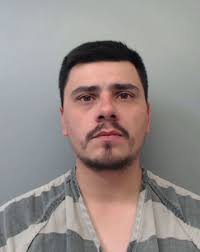 LPD: Man accused of strangling girlfriend, spitting