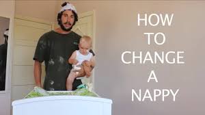 Pull the side tabs to the line that best fits the baby. How To Change A Nappy Youtube