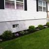 Replacing old foundation vents and installing automatic foundation vents crawl space ventilation. 1