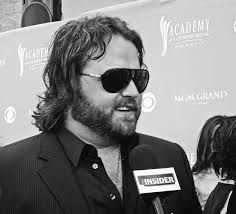 Student storms UT, kills self