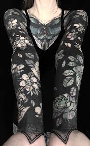 These Striking Solid Black Tattoos Will Make You Want To Go All In Solid Black Tattoo Blackout Tattoo Cover Up Tattoos For Women