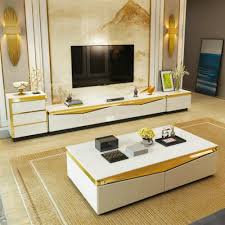 With an under table storage shelf, this coffee. Set Of Gold Colored Steel Tv Stand Coffee Table And Side Table My Aashis