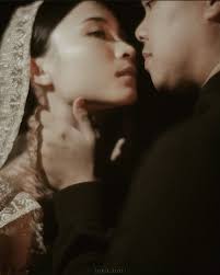 In the language of lace and batik, I wanted to weave a dialogue between  heritage and modernity. The structured corset anchors the body with  strength, while the translucent veil softens it with