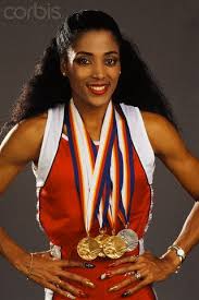 She won a gold medal in the former event. Florence Griffith Joyner Flo Jo Beautiful Black Women Women