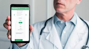 A modern hotel reception area featuring a sleek design. The counter is equipped with digital displays and several computers. The ambient lighting is warm, with pendant lights hanging from the ceiling. Decorative ropes guide visitors along the polished, reflective floor. There is a potted orchid on the counter, adding a touch of elegance.