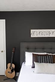 An accent wood wall will make your room look cozier without sacrificing elegance. How To Refresh A Teenage Boys Bedroom With A Painted Feature Wall Teenager Bedroom Boy Boys Bedroom Wallpaper Boy Bedroom Design