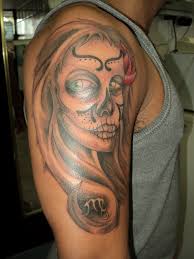 It features a beautiful sugar skull surrounded by gorgeous pink roses and greenery. Sugar Skull Tattoo Meaning Design And Pictures Customskinstattoo
