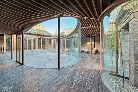Another european sample of the courtyard houses comes from the middle ages where many of the palaces have the central courtyard or atrium (versailles, hatfield palace, etc). Archstudio Breathes Life Into Beijing Courtyard House Interior Design Magazine