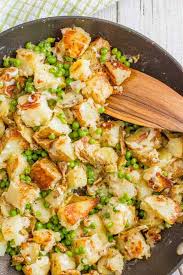 Heat oven to 350° f. One Pan Cheesy Potatoes And Green Peas Family Food On The Table