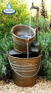 Suspended spigot garden bucket fountain / bucket pump water fountain | pump, buckets and an old. This Beautifully Crafted Water Feature Featuring Two Buckets And A Tap Has Been Exquisitel Water Features Garden Water Fountains Water Features In The Garden