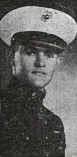 Bandstand flag flying in honor of Wendell Roach