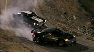 Lucas black wonders what's up with nathalie kelley's big hair in the fast and the furious: The Fast And The Furious Tokyo Drift 1913329