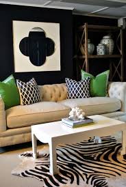 So, it feels like this room came a long way this year with new blinds, ceiling fan, rug and some new chairs. Emerald Green Navy Walls Quadrafoil White Mirror Interior Design Black Living Room Home Living Room