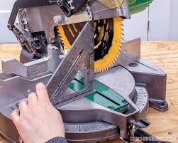 To make the instrument easier to transport, the saw arm can be pushed down and locked into a stopped position. How To Adjust A Miter Saw For Accurate Cuts Saws On Skates