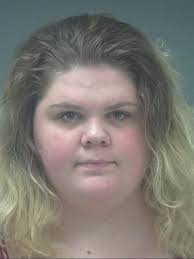 Woman arraigned in Milton drive-by shooting