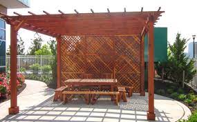 Enclosed Wooden Pergola With Horizontal Slats Enclosed Garden Pergola Kits Built To Last Decades Forever Redwo Pergola Deck Designs Backyard Wooden Garden