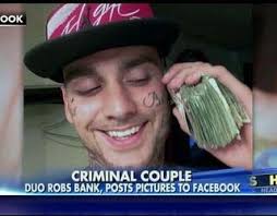 Couple arrested for bank robbery after posting pics to Facebook