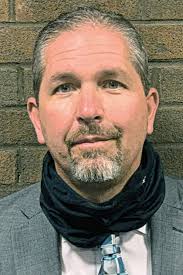 Council OKs promotion of service director