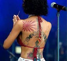 Jhene Aiko S 15 Tattoos Their Meanings Body Art Guru Red Ink Tattoos Back Tattoo Tattoos