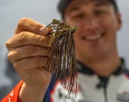 The Mini Mop Jig is equipped with a thinner diameter living rubber skirt to  allow the jig to fall faster then its competitors💪 #buckeyelures #minimop  #jigfishing