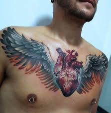 The 100 Best Chest Tattoos For Men Improb Chest Tattoo Men Heart With Wings Tattoo Chest Tattoo