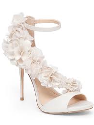 Love Meghan Markle S Timeless White Wedding Shoes Get The Look Here Wedding Shoes Trending Shoes Diy Wedding Shoes