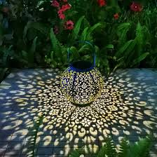 Solar floodlights are a type of solar powered lights which are held through a large (mostly) adjustable panel positioned towards an. Solar Large Lantern Outdoor Hanging Lights Metal Decorative Garden Lights Waterproof Table Lamp For Patio Courtyard Party Decorations 1 Pack Teal Blue Walmart Com Walmart Com