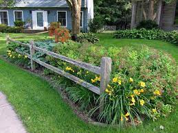 Made popular by farmers in america during the nineteenth century, this type of fence was replaced by the cheaper barbed wire which proved to be more effective. Beth S Garden In Iowa Day 1 Small Front Yard Landscaping Landscaping Around Trees Fence Landscaping