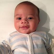 It is the child of Donald Faison! The dude with the mole from Clueless and Scrubs.. You gotta admit, the little guy is the splitting image of old pops! - 1383401400_cacee-cobb-baby_1