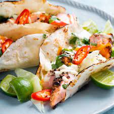 In a large, rimmed dish whisk together orange zest and juice, lemon zest and juice, soy sauce, olive oil, sesame oil, shallot, garlic, parsley, ginger, and black pepper. Spicy Grilled Fish Tacos Marion S Kitchen Recipe In 2021 Grilled Fish Tacos Grilled Fish Seafood Recipes