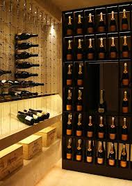 The float wine display system uses architectural cables & glass to suspend wine bottles, neck or label forward. Looking Out For Custom Wine Racking Systems Canada Based Cable Wine Systems Provides Wire Wine Display Etalage De Vin Etageres A Bouteilles De Vin Cave A Vin