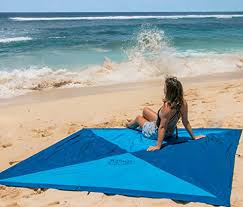 A beach blanket comprising at least one hole for receiving an umbrella so that when the shaft of the umbrella is positioned over the blanket, the canopy of the umbrella provides shade over the blanket. Beach Blanket Test Comparison 2021 Buy Test Winner Cheaptest Vergleiche Com Compare The Test Winners Test Compare Offers Bestsellers Buy Product 2021 At Low Prices