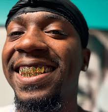 Serving golden smiles, one person at a time 💯 #grillz #GoldGrillz  #goldteeth #goldjewelery #fyp #foryourpage #explore #exploremore