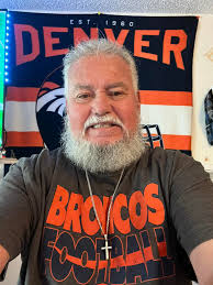 Wearing all my gear 🏈🧡💙