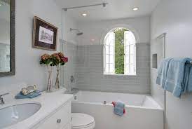The marble floor slopes down into the shower, so there is no threshold to step over. 75 Beautiful Traditional Tub Shower Combo Pictures Ideas July 2021 Houzz