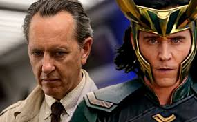 He has blue eyes and light brown hair. Is Richard E Grant Playing Another Incarnation Of Loki In The Disney Series The Ronin