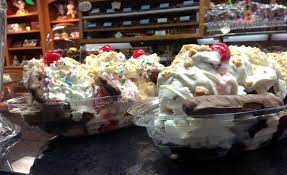 The Banana Split And Brownie Ala Mode Side By Side Www Dunmorecandykitchen Com Banana Split Ice Cream Food