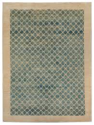 The fashionable moroccan tile look is fresh in this dallas shag rug with ivory patterning on a dark grey shag texture. Arzu Studio Hope Dallas Rugs