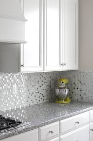 This may have a large section of black and white concentrated in one area. 5 White Glass Metal Backsplash Tile Luna Pearl Granite Countertop