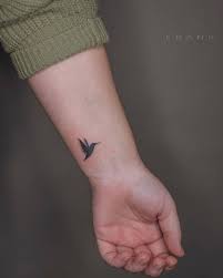 As said, a hummingbird art is very meaningful. Hummingbird Tattoo On The Wrist Hummingbird Tattoo Hummingbird Tattoo Black Bird Tattoos For Women